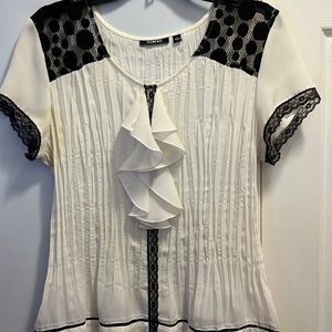 Nice white top with black trim.